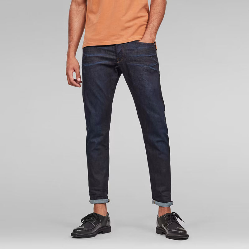 Man wearing G-Star regular tapered jeans